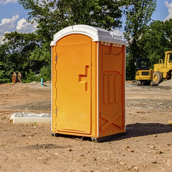 what is the cost difference between standard and deluxe portable restroom rentals in Amherst Nebraska